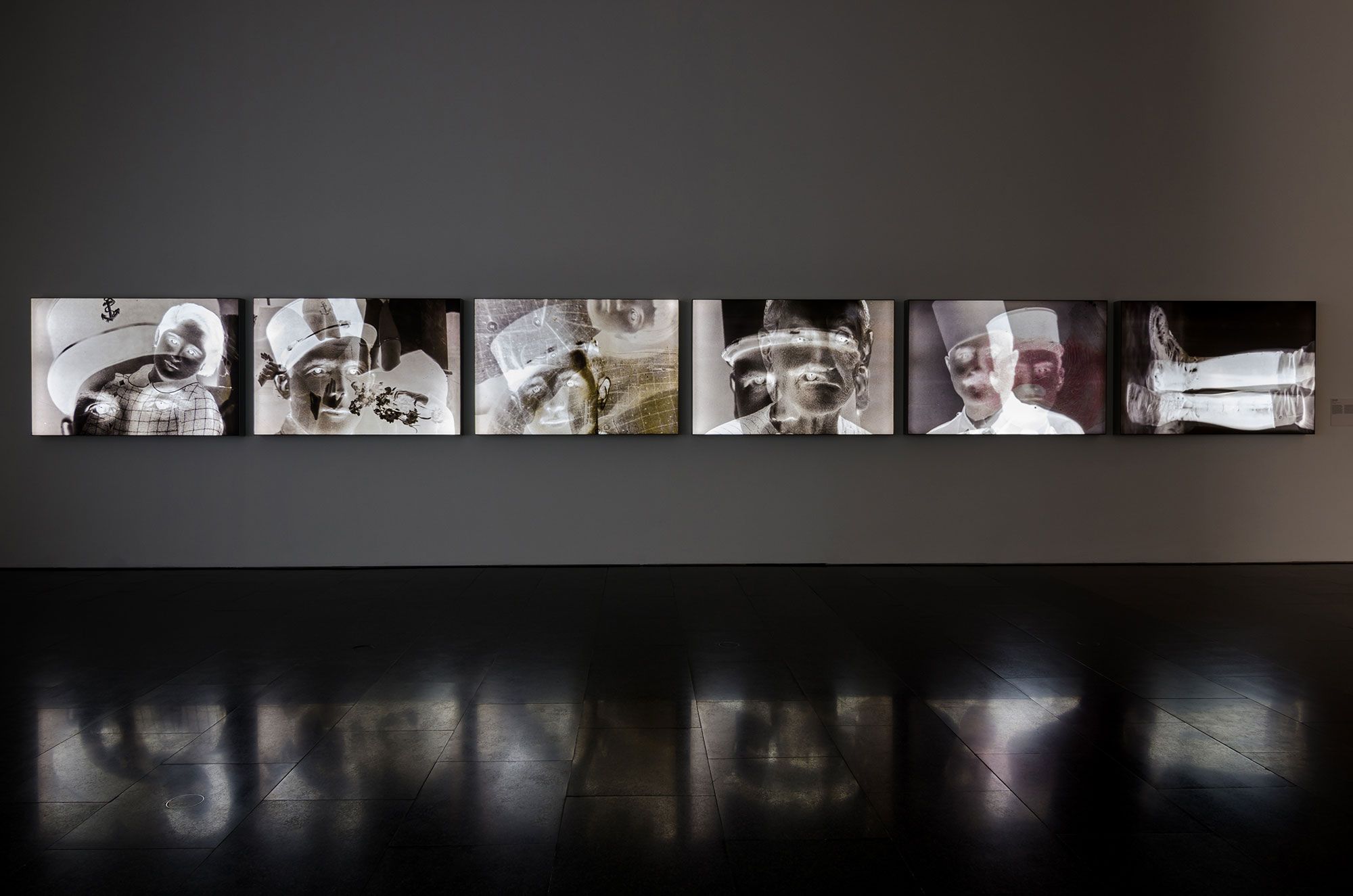 Figure 1. Akram Zaatari, Faces to Faces, 2017. 6 pigment inkjet prints on backlit UV cloth, 100 x 150 x 10 cm. 39 3/8 x 59 1/8 x 4 in. © Akram Zaatari. Courtesy of the artist, MACBA and Thomas Dane Gallery, London. Photo: Mahmoud Merjan