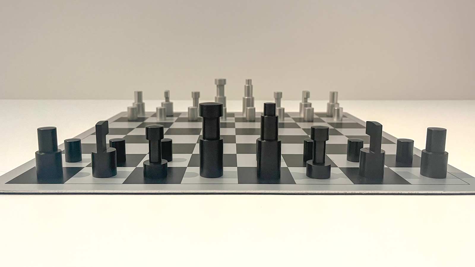 Fig. 6. Vilmos Huszár, chess board with chess men, design 1921, production of this example 1974, aluminium. Stedelijk Museum Amsterdam, Photo by Ginger van den Akker.