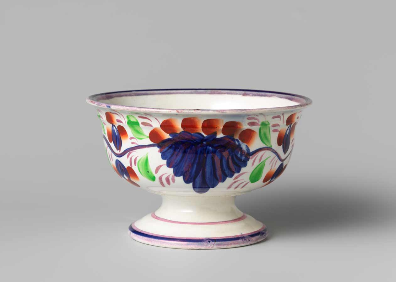 Fig. 10 Bowl with boerenbont motif, c. 1801-c. 1879. Glazed earthenware, prod. Petrus Regout, Maastricht. Rijksmuseum, Amsterdam. Adherents of “good design” rejected illustrative motifs on household objects; they preferred more two-dimensional, abstract designs such as boerenbont, which favored patterns inspired by the rural Dutch landscape.
