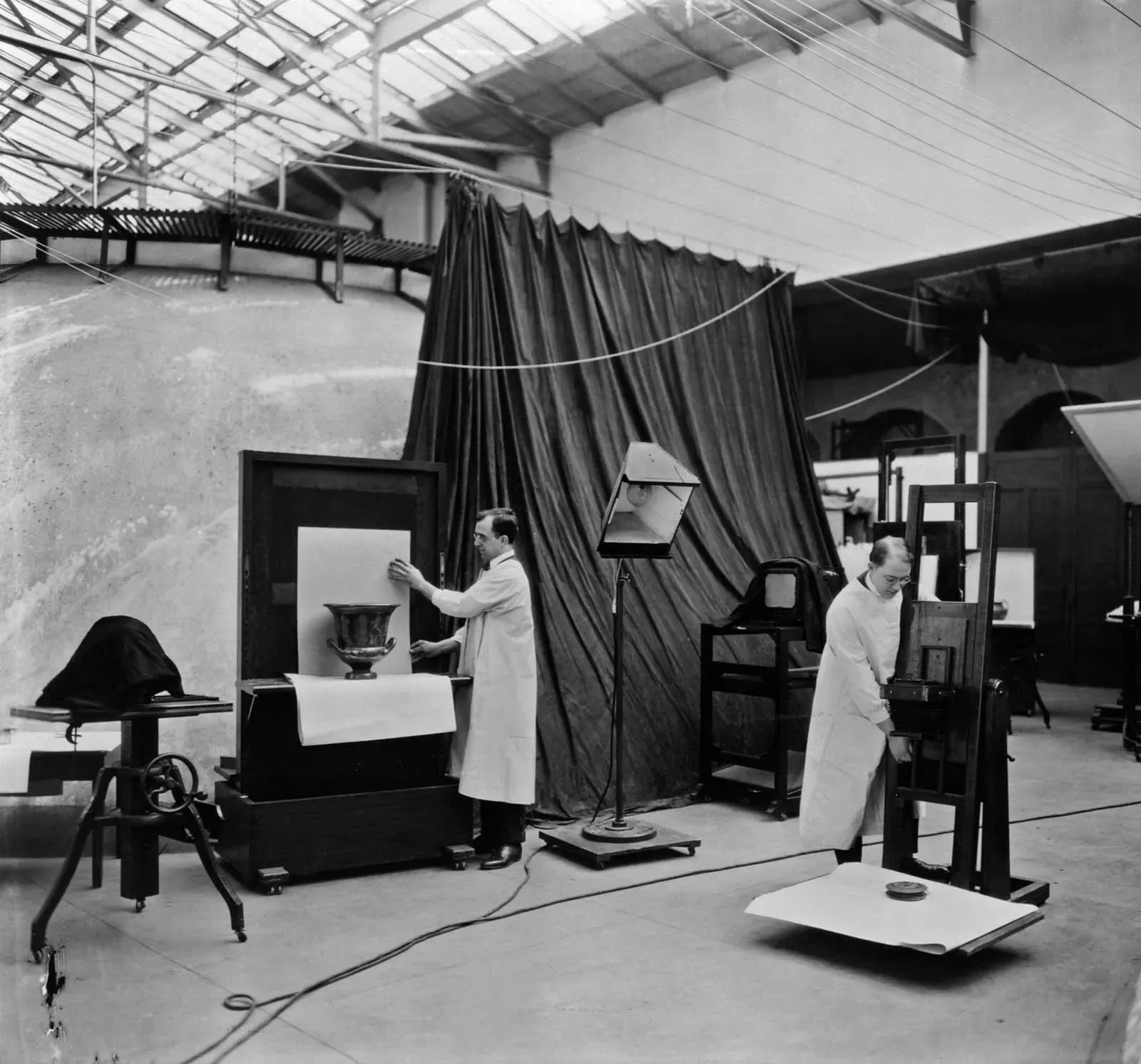 Figure 5 - Copy of 1924 photograph of photographers at work in the ‘operating room’ (in the High Attic), The Metropolitan Museum of Art. Museum reference #: MM1029B. Photographer: not recorded.