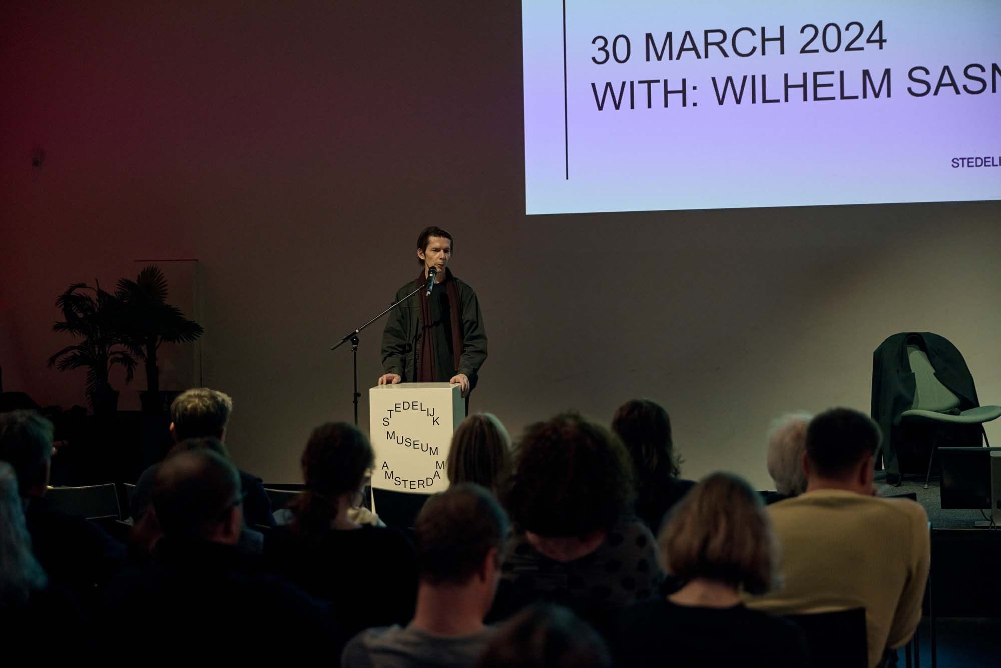 Adam Szymczyk moderates the conversation Artist Talk with Wilhelm Sasnal at the Stedelijk Museum on March 30, 2024. Photo: Remco Sijtzema.