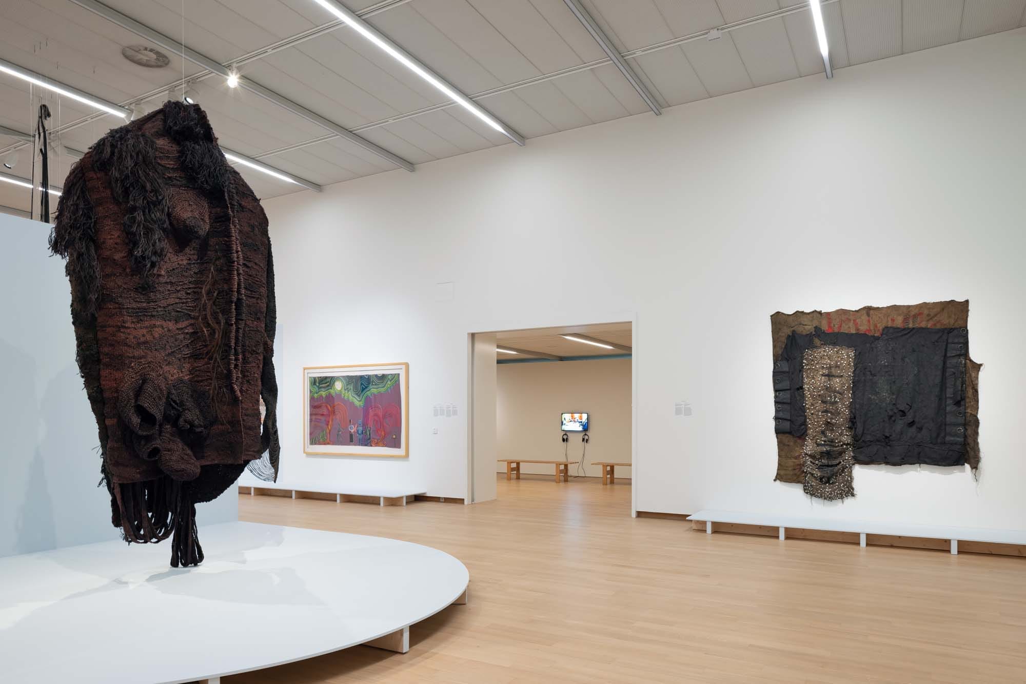 Fig. 14. Ibrahim Mahama, DIMANG BE YOLI (right), 2019. Scrap metal, tarpaulin, and metal tags on jute sacks. 225 × 245 × 12 cm. Courtesy of the artist. Photo by Peter Tijhuis.