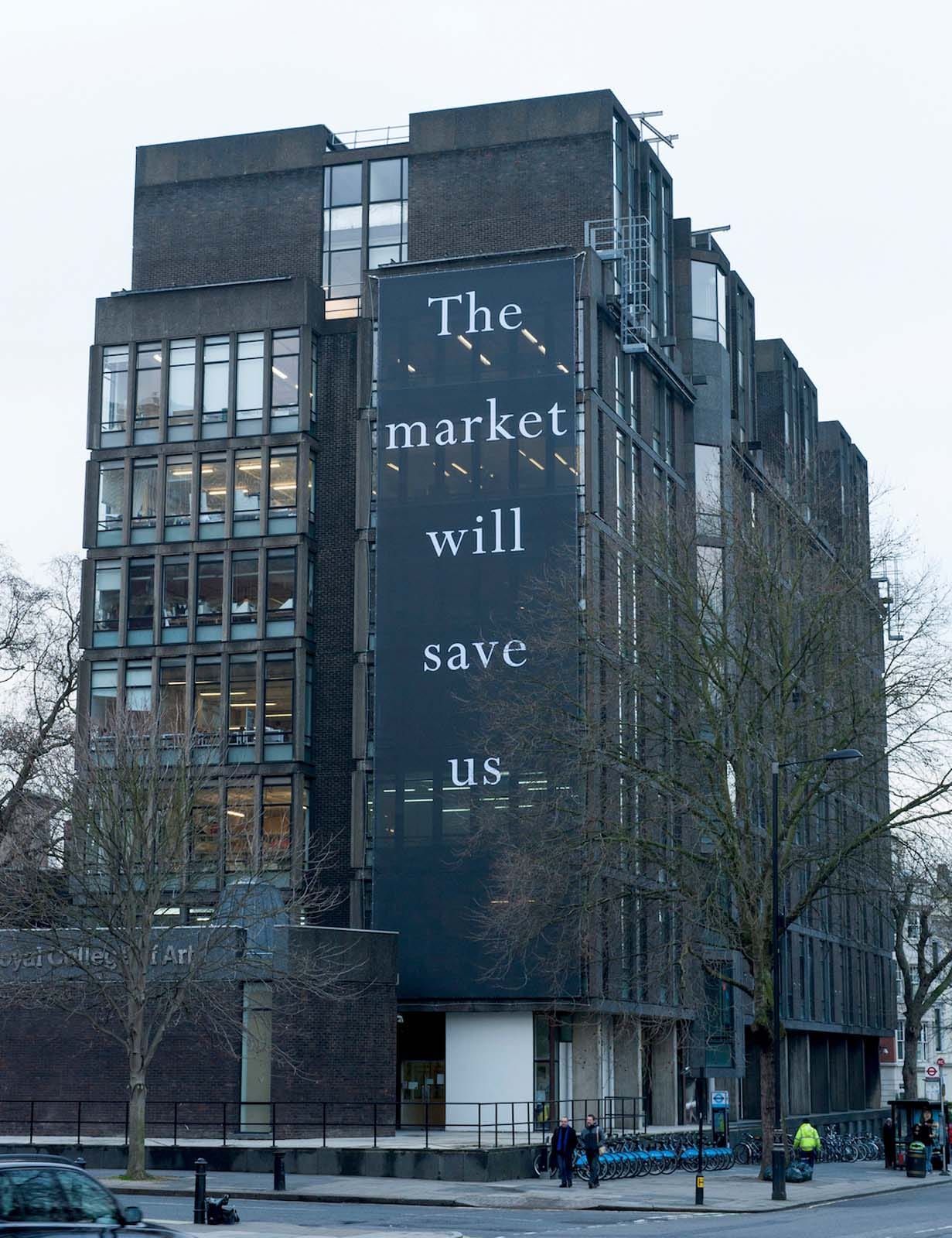 Figure 1. Bill Balaskas, The market will save us, 2013. Banner (Verseidag mesh supreme) on the facade of the Royal College of Art, London, 23.4 x 6.8 m. The intervention was realized with the support of Irene Y. Panagopoulos. Photo by Dominic Tschudin.